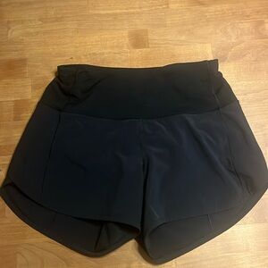 Lululemon black high rise 4 inch speed ups. Size: 2